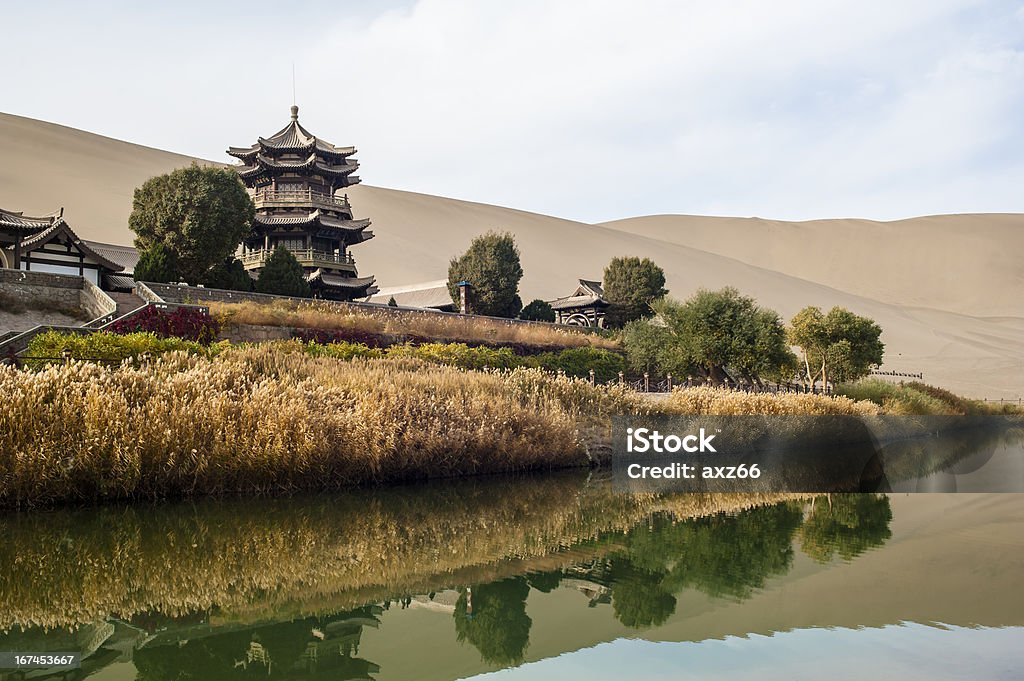 Crescent Spring and Mingyue Pavilion in the morning, Crescent Spring and Mingyue Pavilion in the morning, Dunhuang of China Arid Climate Stock Photo