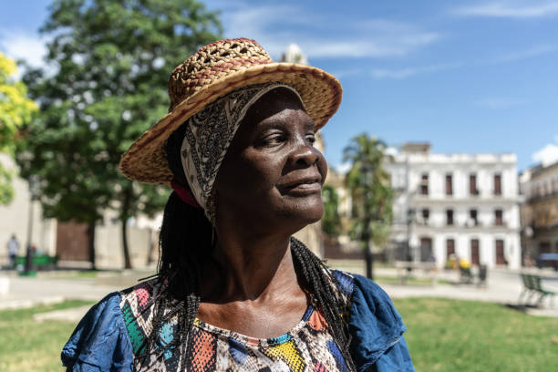 istock Senior woman looking away at public park 1674538557