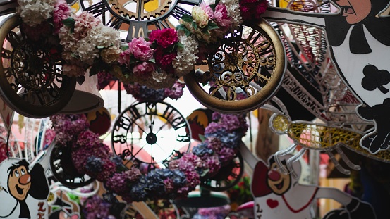 Many old clocks and watches on a decoration flower pattern