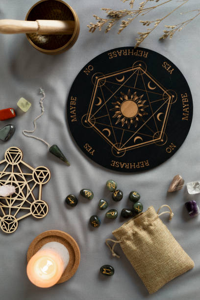 istock Crystal grid, set of rune stones, pendulum boardfor divination and fortune telling 1674572092