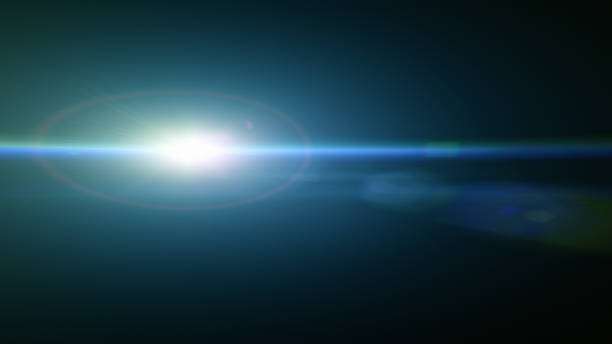 istock Blue lens flare overlay on black background design element 1674612710