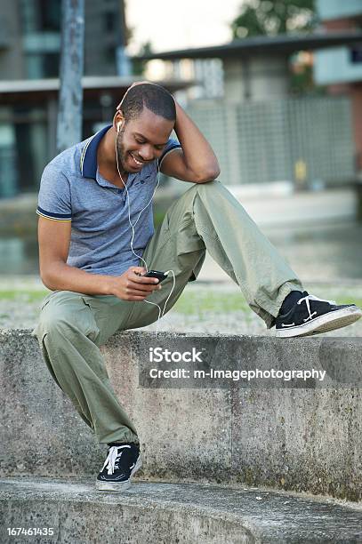 African American Man Listening To Music Stock Photo - Download Image Now - Adult, Adults Only, African Ethnicity