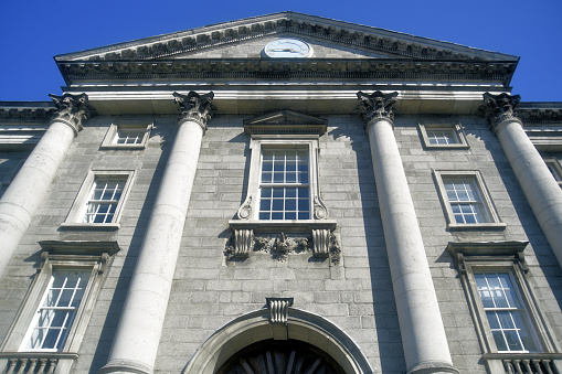 Dublin, Ireland: Trinity College - Regent House, the main entrance with its prostyle tetrastyle Corinthian portico - founded in 1592 by Queen Elizabeth I, on the model of the universities of Oxford and Cambridge - consistently ranked as the best university in Ireland, one of the leading universities in Europe and in the top 200 worldwide.