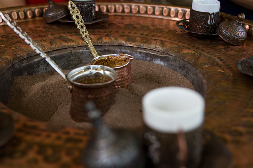 Making Turkish Coffee In Hot Sand