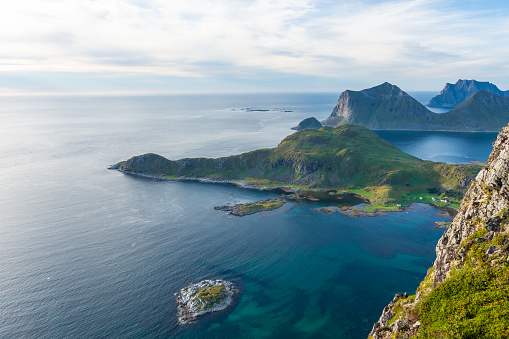 Beautiful landscape of the Lofoten Islands during the golden hour, view from Offersoy Mount trail, Norway