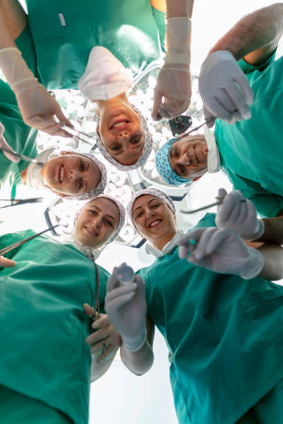 istock Team of nurses and surgeons in surgery. 1674658613
