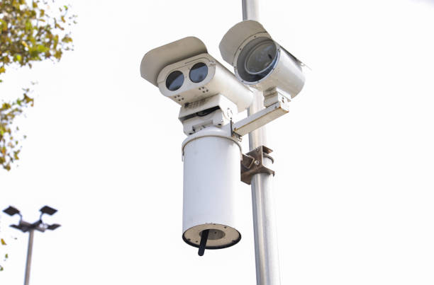 istock Security camera technology on urban street, ensuring public safety and surveillance 1674659703
