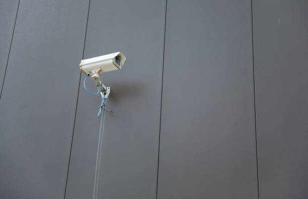 istock Security camera technology on urban street, ensuring public safety and surveillance 1674659704