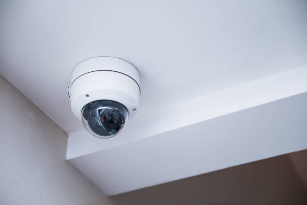 istock Security camera technology on urban street, ensuring public safety and surveillance 1674659717