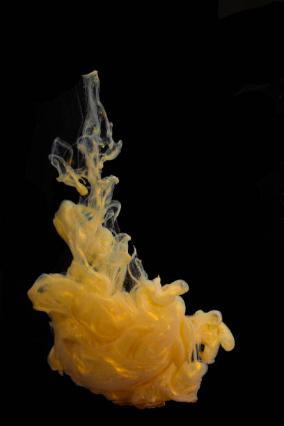 istock Paint swirling in water 1674684335