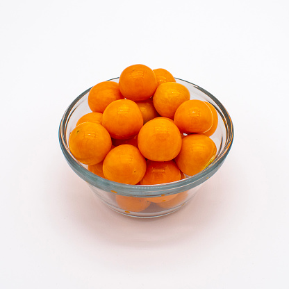Close up photo of ripe golden goose berries on a white background