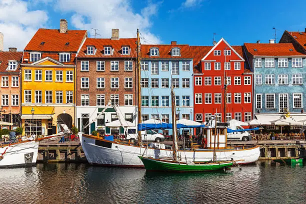 Scenic summer view of color buildings of Nyhavn in Copehnagen, Denmark. Visit also lightbox of high quality photos of Scandinavia: