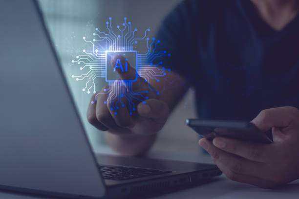 istock Business people use laptop and smartphone, hand finger touching with Artificial intelligence AI circuit board in shape electronic PCB circuit icon symbol. Innovative technology Machine learning. 1674849063
