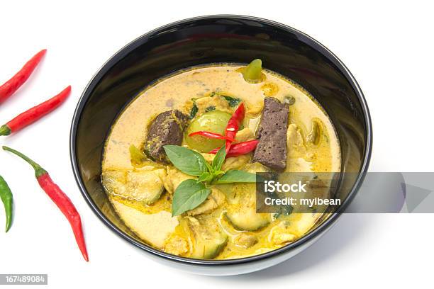 Thai Green Curry With Chicken In A Black Bowl Stock Photo - Download Image Now - Chicken Curry, Green Curry, Lemon Grass