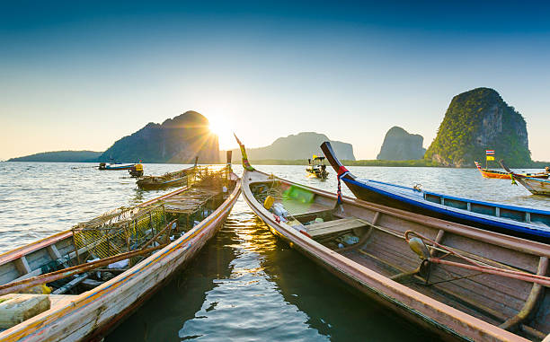 istock Long Tail boat sits in the beautiful beach 167491961