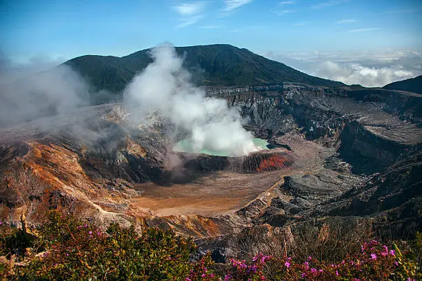 Volcano Poas, surrounded by a dramatic landscape.