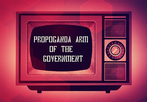 A red tinted grunge paper craft styleTelevision with the words 'PROPOGANDA ARM OF THE GOVERNMENT' in the picture. This is for a concept about learning what the television really is; a box in the corner of your room telling you what vision you are to believe and programming your beliefs. This is for a new trend in the rebirth of the cultural movement from the 1970's and 1980's to kill your television. Now.