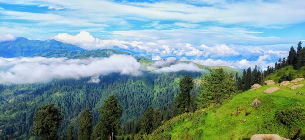 istock Scenic View of mountains engulfed in clouds 1675015108