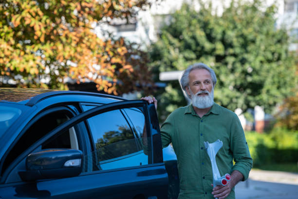 istock An elderly man with a disability and on crutches 1675055471