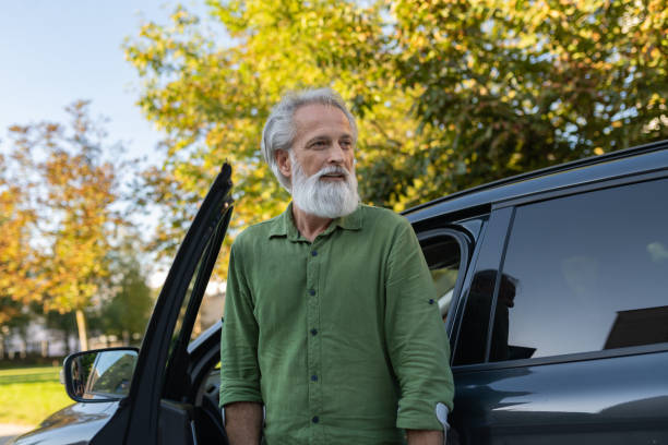 istock An elderly man with a disability and on crutches 1675055476