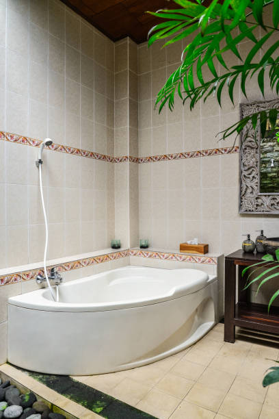 istock Bathroom with washbasin, mirror  and bath 1675063235
