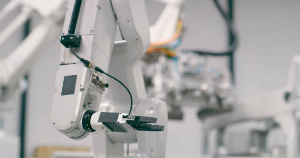 istock Arm, robotics laboratory and machine learning in factory, engineering or futuristic development in closeup. Electronics, innovation and automation in research, creativity or manufacturing at workshop 1675091861