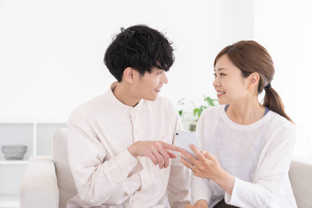 istock couple at modern home , smart phone 1675120491
