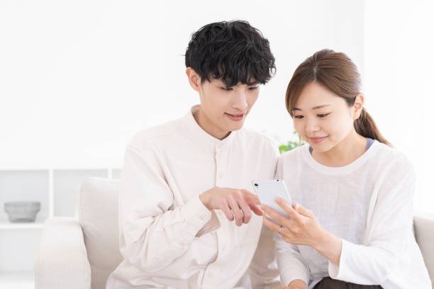 istock couple at modern home , smart phone 1675124294