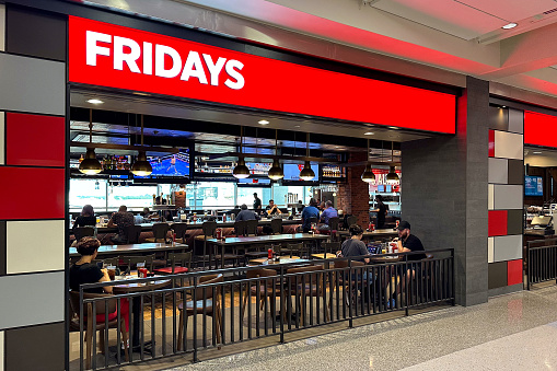 Dallas, Texas - August 25th, 2023: TGIF Fridays Restaurant - Dallas DFW Airport.