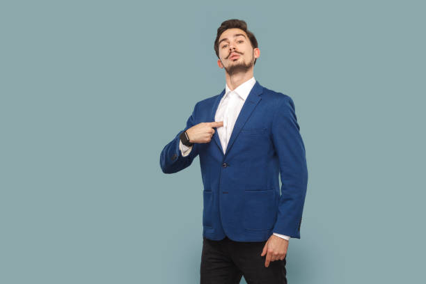 istock Self confident proud man with mustache standing pointing at himself, looking at camera with pride. 1675146419