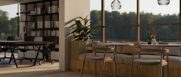 istock A modern and comfortable co-working space or office relaxation area with tables and chairs. 1675158885