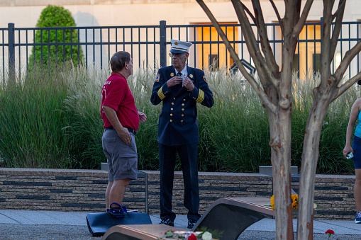 Arlington VA, Sep 11 2023: At the 911 memorial on the west side of the Pentagon in Arlington Virginia, many civilians came to commemorate the US Department of Defense staff and rescue workers who were killed in a terrorist attack 22 years ago.