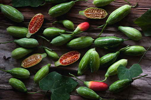 Ivy gourd. scientific name: Coccinia grandis. Red Ripe and raw fruits