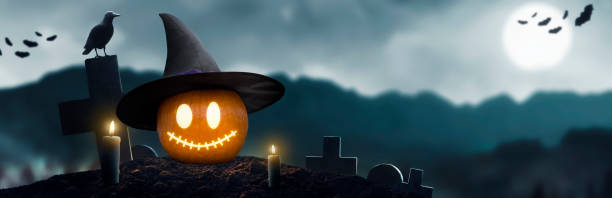 istock Jack O' Lantern on spooky Halloween night with glowing eyes - copy and paste 1675220954