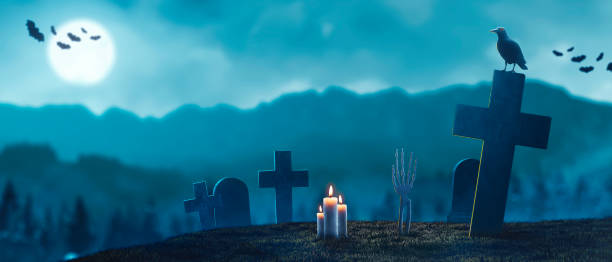 istock Spooky background of a cemetery under moonlight on Halloween night - copy space 1675221257