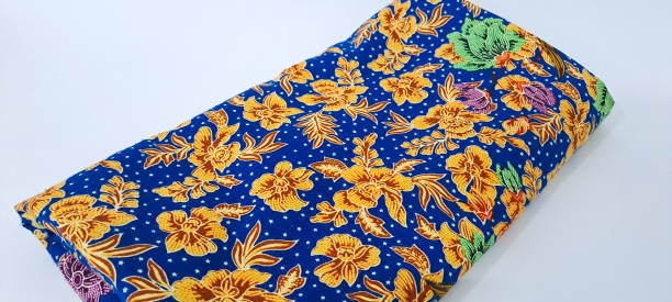istock folding jarik or traditional Indonesian batik cloth isolated on white background. Javanese tradisional cloth 1675234589