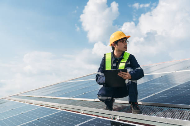 istock Service engineer checking solar cell on the roof for maintenance if there is a damaged part. Engineer worker install solar panel. Clean energy concept. 1675299913