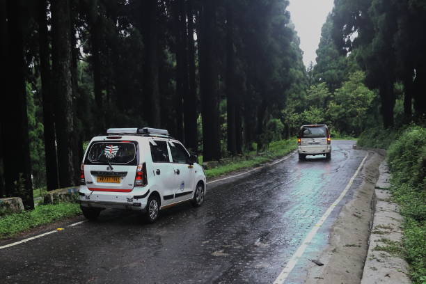 long-drive trip through beautiful wild mountain road in the weekend Darjeeling, West Bengal, India - 27th June 2023: long-drive trip through beautiful wild mountain road in the weekend and enjoy the special time tropical rain stock pictures, royalty-free photos & images