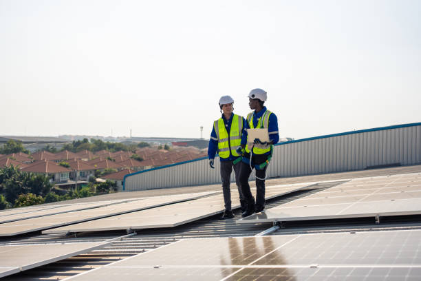 istock Professional engineer work to maintenance of photovoltaic panel system. Technician inspection working by check solar cell panels equipment at solar cell factory. Ecology and alternative power concept. 1675306508