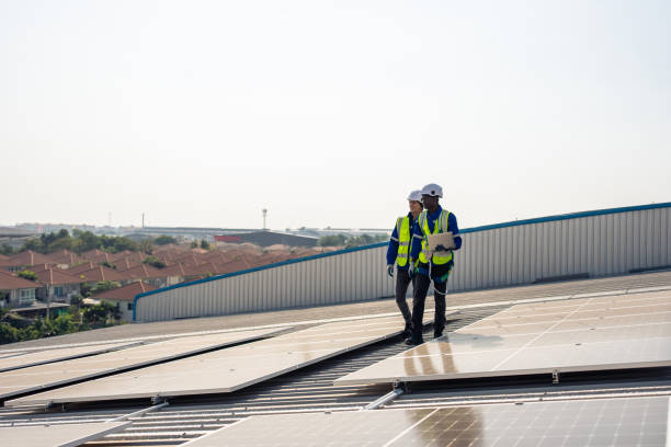 istock Professional engineer work to maintenance of photovoltaic panel system. Technician inspection working by check solar cell panels equipment at solar cell factory. Ecology and alternative power concept. 1675306528