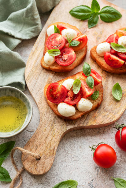 istock Bruschetta with tomato, basil and mozzarella cheese 1675308064
