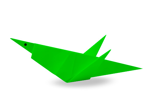 An origami bird on a white background