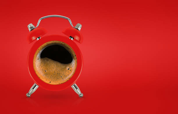istock Alarm clock like a cup with coffee 1675316001