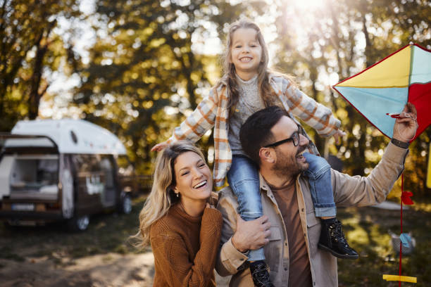 istock Fun with a kite at trailer park! 1675330704