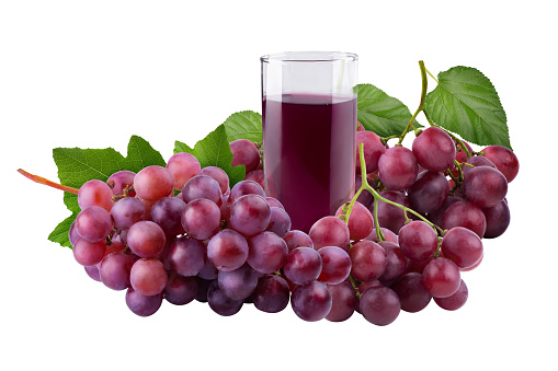 Red Grapes and Fresh Red Grapes juice in a glass isolated on a white background