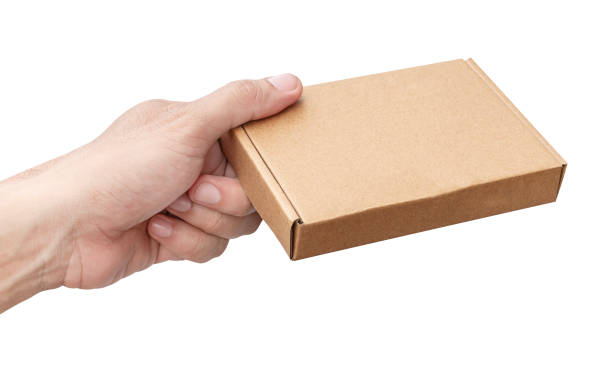 istock Hand hold small carton box isolated on white background with clipping path 1675381972