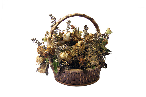 dried flowers bouquet in a basket.