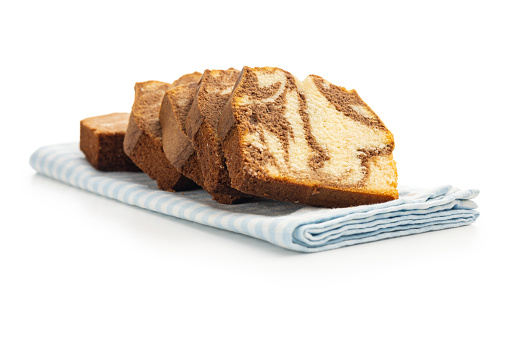Marble sponge cake. Cake with cocoa and vanilla taste isolated on the white background.