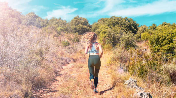 istock Woman running in the nature- sport, active, training concept 1675447943
