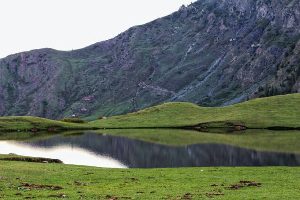 istock Small Natural lake in Meadows 1675478683